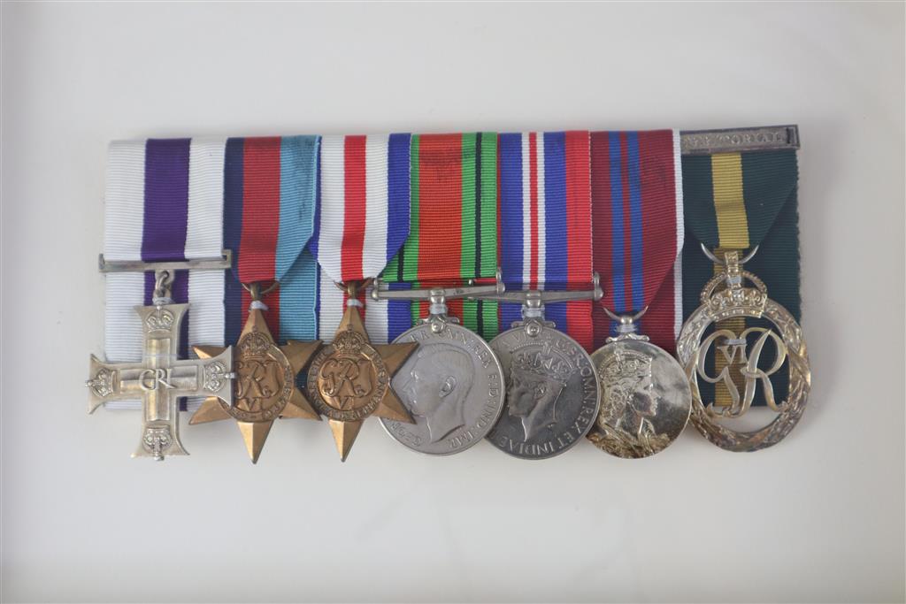 A WWII Military Cross group of seven to Major Leonard Elliot Dickson, CBE, MC, Glasgow Highlanders Light Infantry,